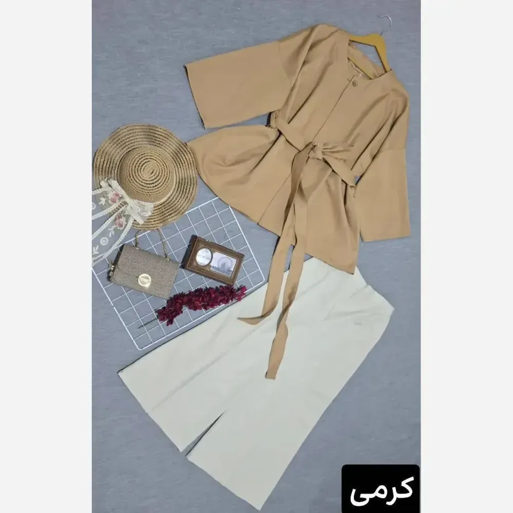 مانتو شلوار شنیز مازراتی فری سایز تا 48 رنگ بندی متنوع قد مانتو 73 قد آستین 55 دور سینه 115 قد شلوار 90
